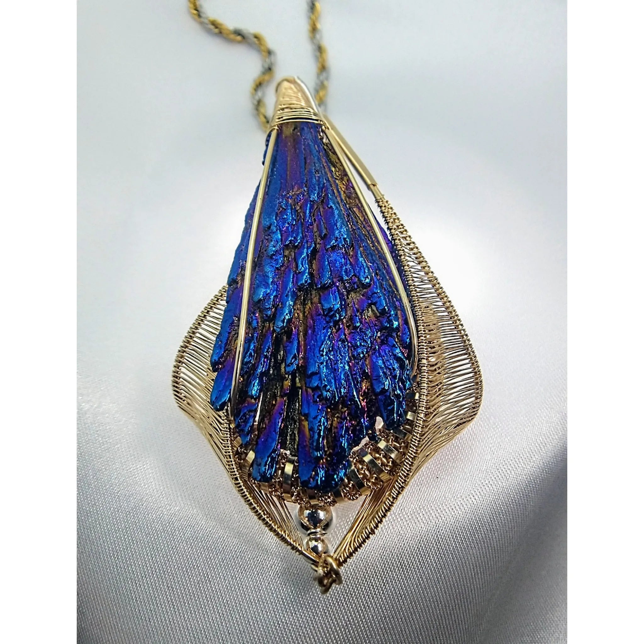 Frequency Blade: Titanium Kyanite Amulet